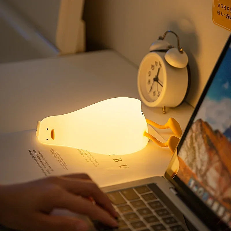 LazyDuck – Lying Flat Silicone Night Light Down but glowing.