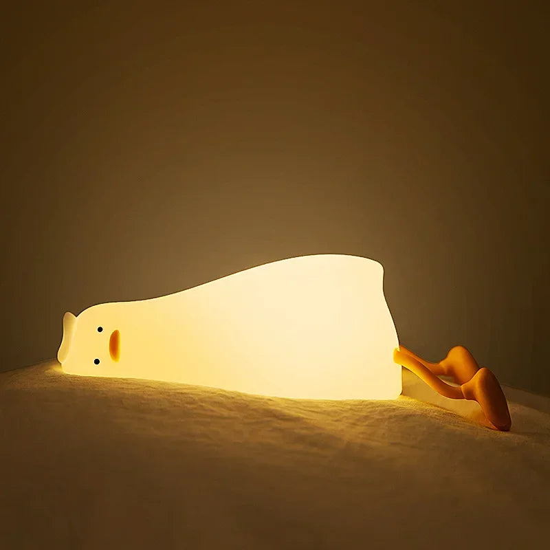 LazyDuck – Lying Flat Silicone Night Light Down but glowing.