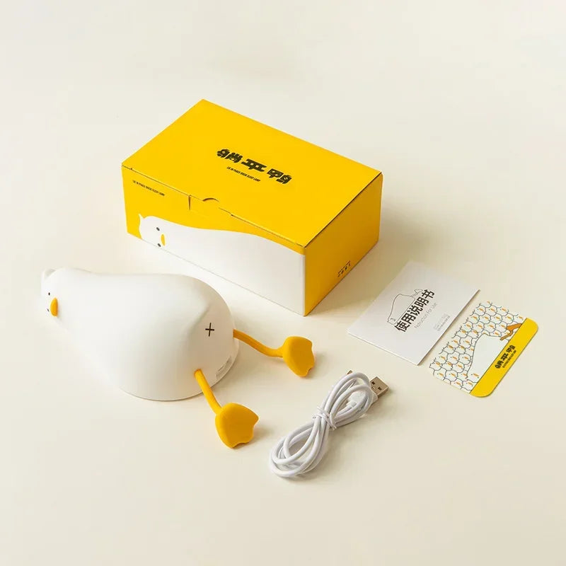 LazyDuck – Lying Flat Silicone Night Light Down but glowing.